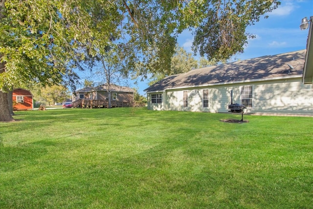 view of yard with a deck