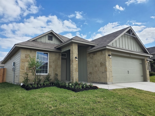 view of front of house with a garage and a front lawn