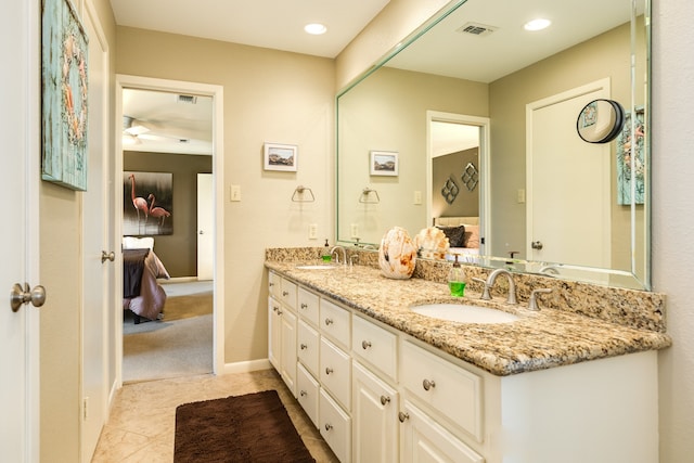 bathroom with vanity, ceiling fan, and tile patterned floors