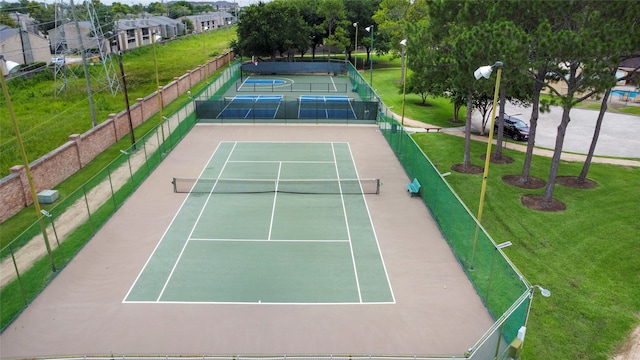 view of tennis court with basketball court