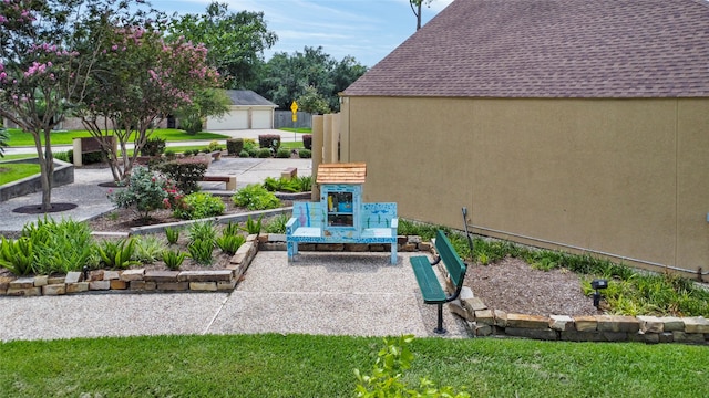 exterior space with a garage