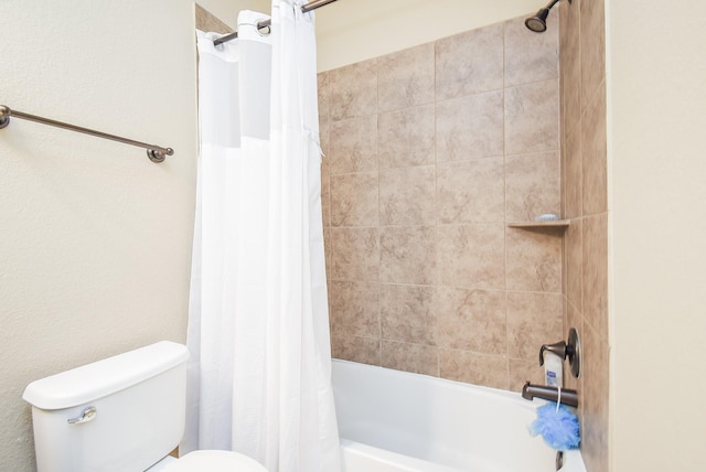 bathroom featuring toilet and shower / tub combo with curtain