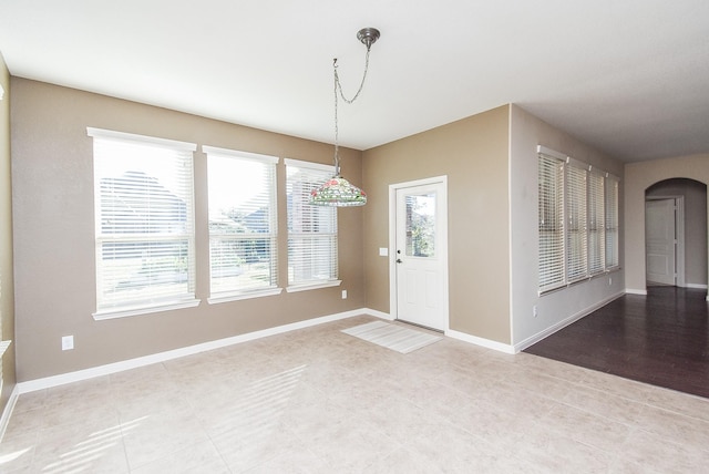 entrance foyer featuring light tile patterned floors