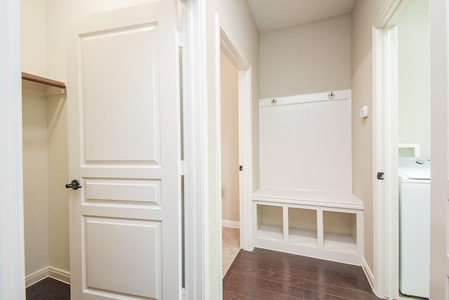 mudroom with dark wood-type flooring and washer / clothes dryer