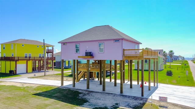 view of jungle gym featuring a lawn and central AC unit