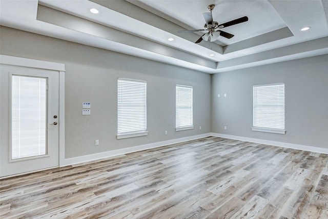 894 W Ln, Crystal Beach, TX 77650 - spare room featuring a ceiling fan, baseboards, recessed lighting, and light wood finished floors