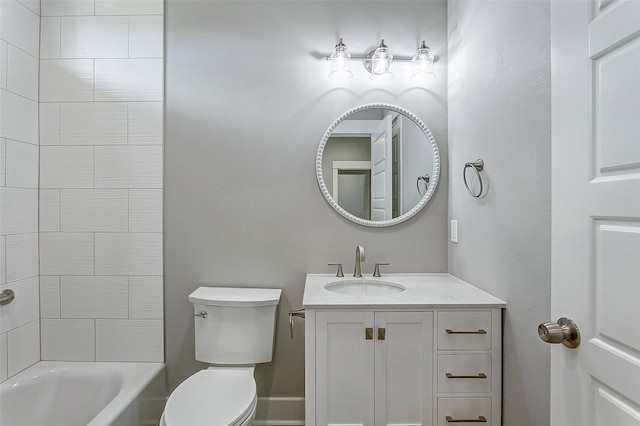 full bathroom featuring tiled shower / bath combo, vanity, and toilet