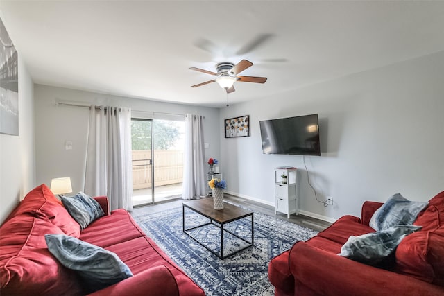 living room with hardwood / wood-style floors and ceiling fan