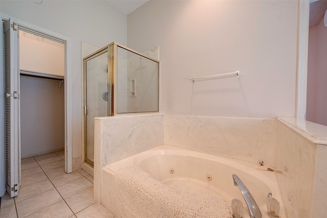 bathroom featuring independent shower and bath and tile patterned floors