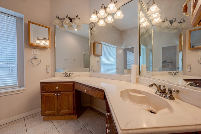 bathroom with tile patterned flooring and vanity