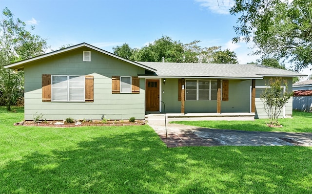 ranch-style home with a front lawn