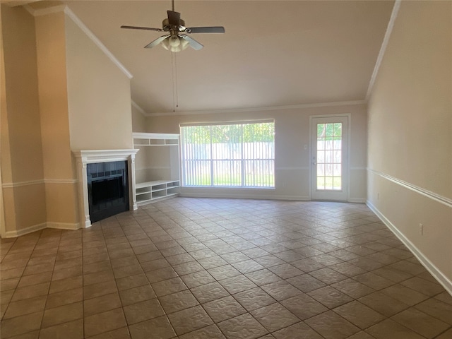 unfurnished living room featuring a fireplace, ornamental molding, ceiling fan, and tile patterned floors