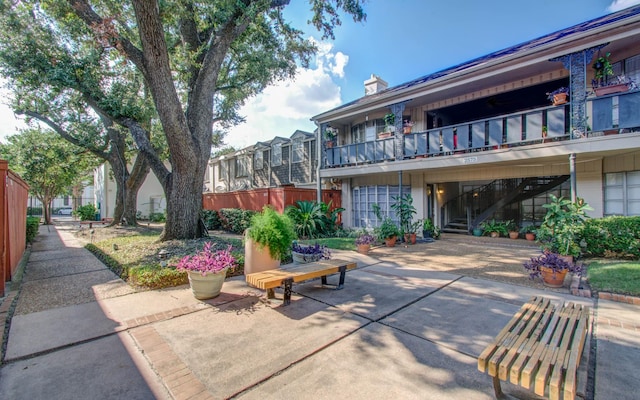 2575 Marilee Ln Unit 1, Houston, TX 77057 - view of community with stairs and a patio area