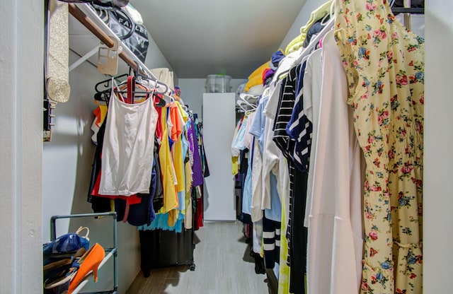 2575 Marilee Ln Unit 1, Houston, TX 77057 - walk in closet featuring wood finished floors
