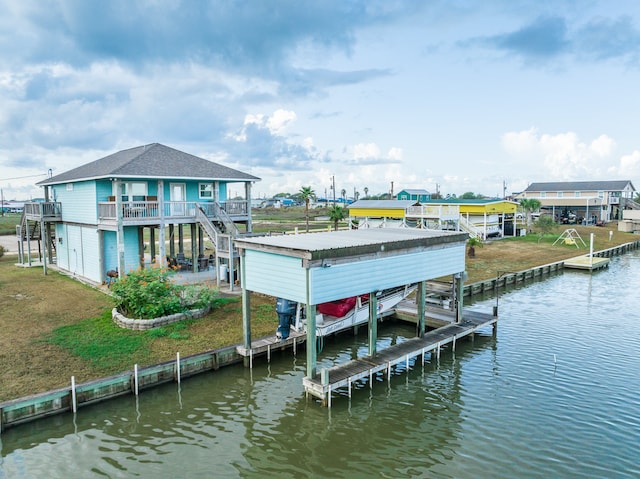 dock area with a water view