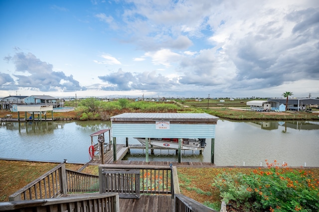 dock area with a water view