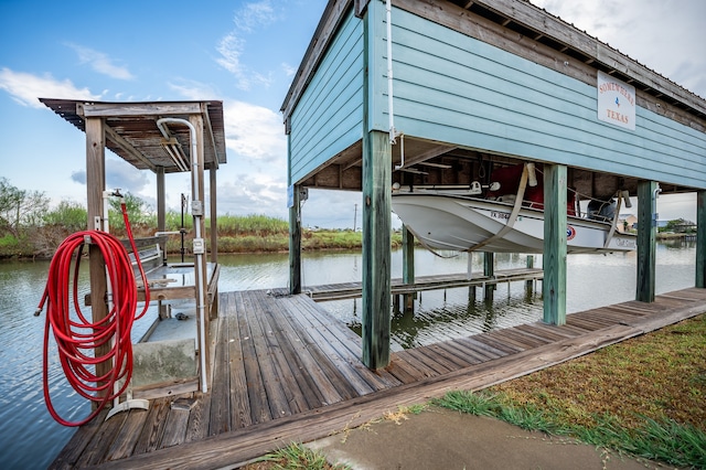 view of dock with a water view