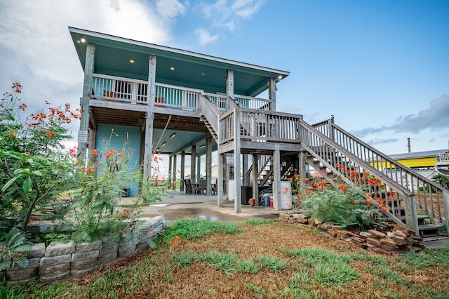 back of property with a patio