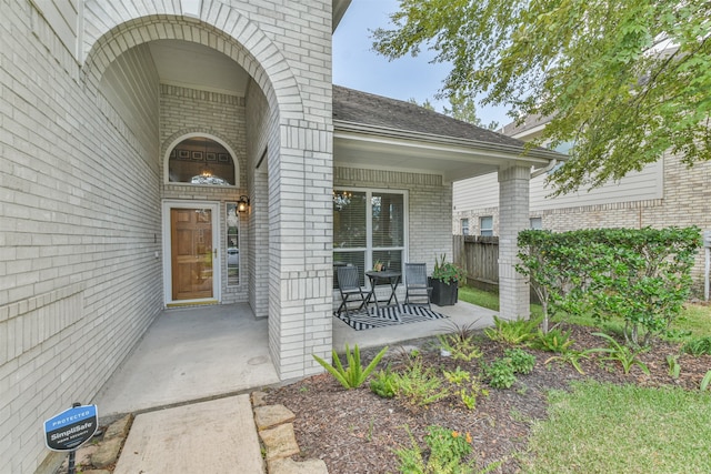 entrance to property with covered porch