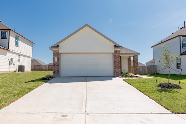 single story home featuring central AC, a front lawn, and a garage