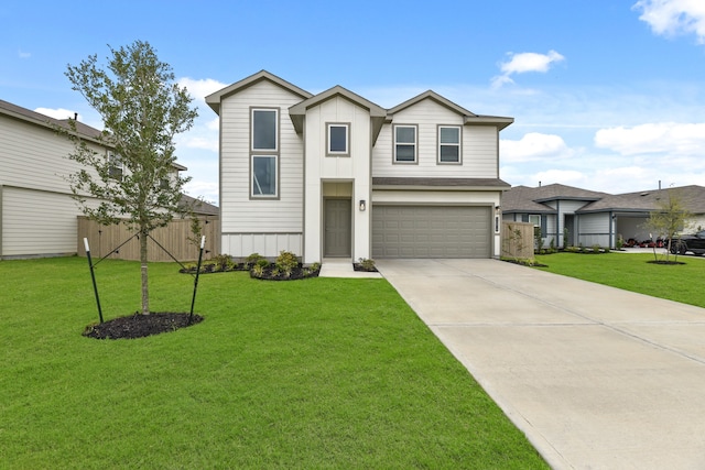 view of front facade featuring a front lawn and a garage