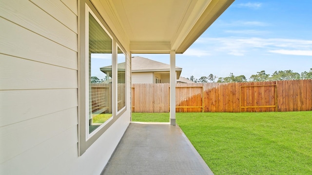 view of yard with a patio and a fenced backyard