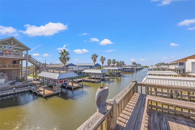 view of dock with a water view