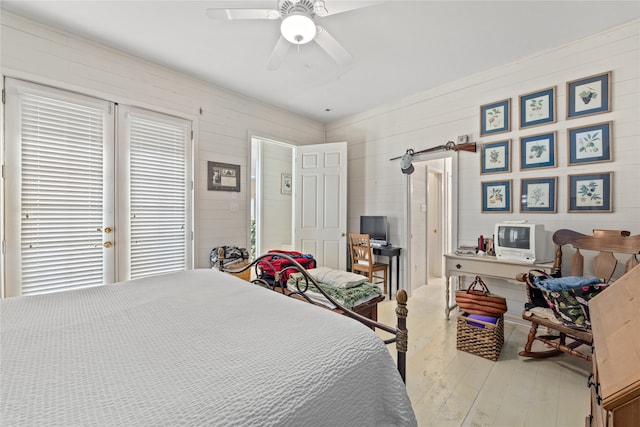 bedroom featuring ceiling fan and hardwood / wood-style flooring