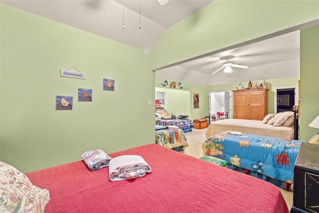 bedroom featuring ceiling fan and lofted ceiling