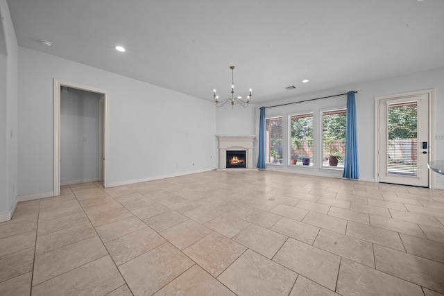 unfurnished living room with light tile patterned floors and an inviting chandelier