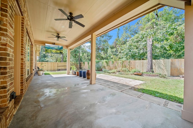 view of patio featuring ceiling fan