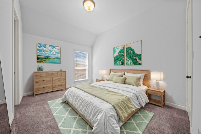 carpeted bedroom featuring lofted ceiling