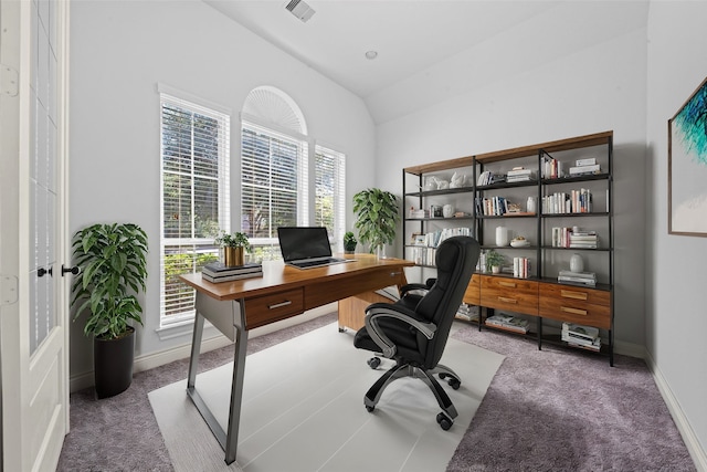 office featuring carpet flooring and vaulted ceiling