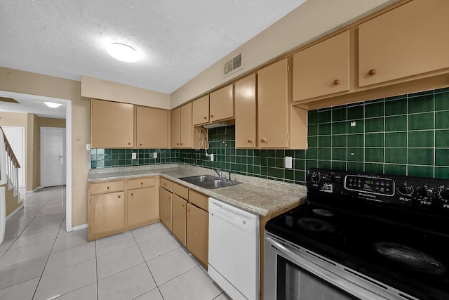 kitchen with light tile patterned floors, sink, tasteful backsplash, dishwasher, and black range with electric cooktop