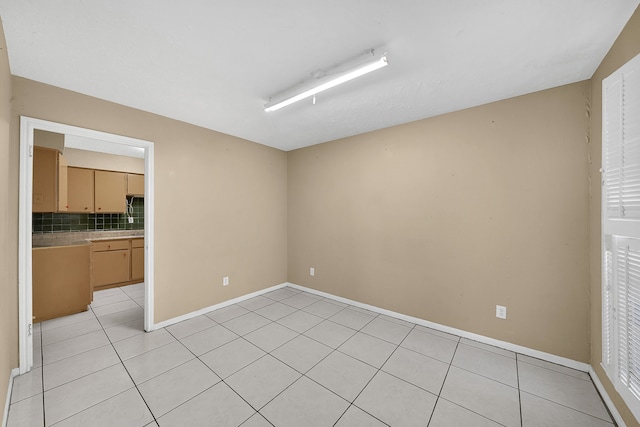 view of tiled spare room