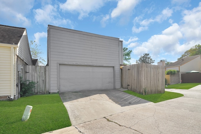 garage featuring a yard