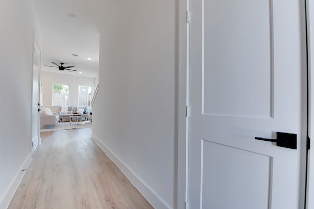 hallway with light wood-type flooring