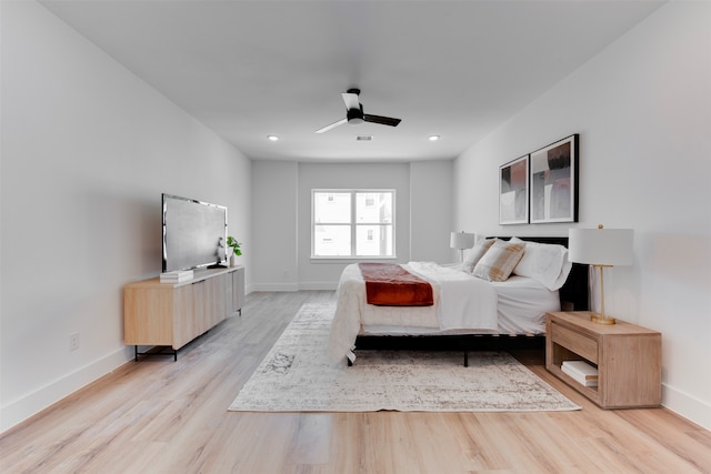 bedroom featuring ceiling fan and light wood-type flooring