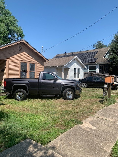 view of home's exterior featuring a yard