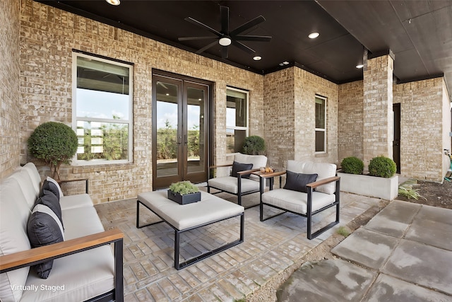 view of patio featuring outdoor lounge area, french doors, and ceiling fan