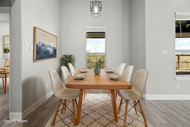 dining room with light hardwood / wood-style floors