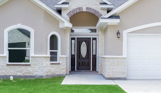 property entrance with a garage