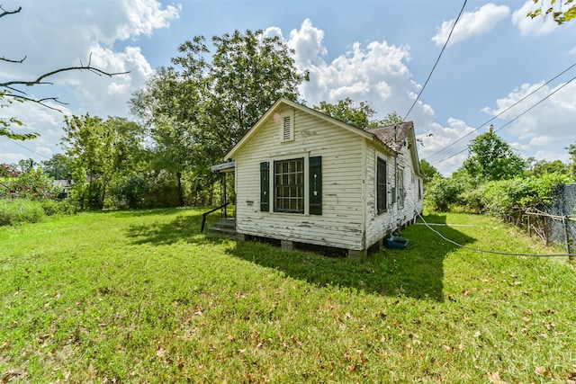 exterior space with a lawn