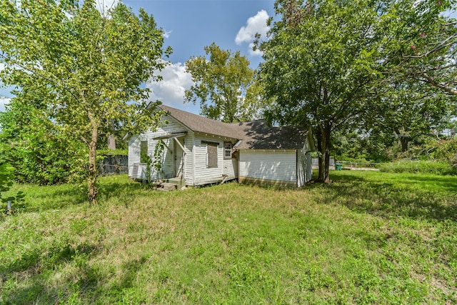 exterior space with a yard