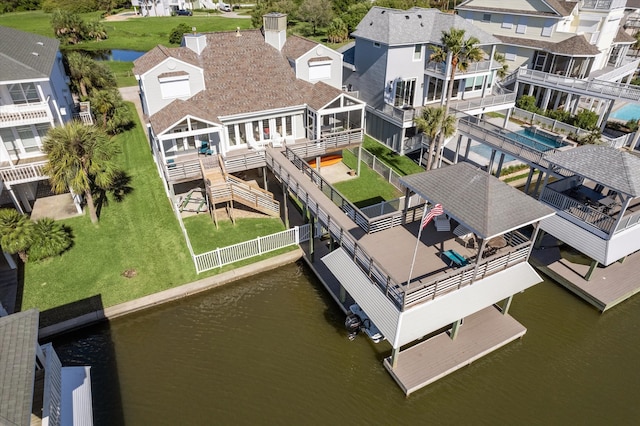 drone / aerial view featuring a water view