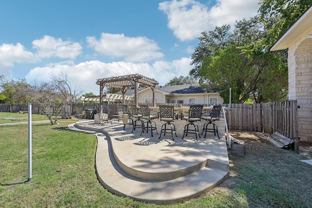 exterior space with a pergola and a patio area