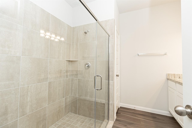 bathroom with vanity and an enclosed shower