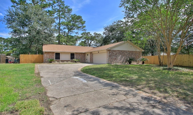 ranch-style home featuring a front yard and a garage