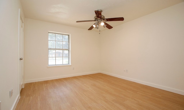 unfurnished room featuring ceiling fan and light hardwood / wood-style flooring