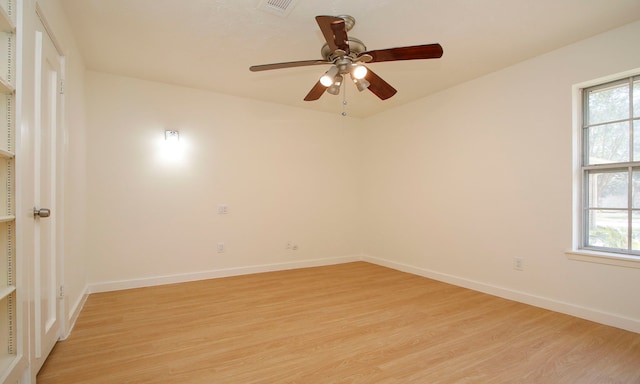 unfurnished room with light hardwood / wood-style floors and ceiling fan